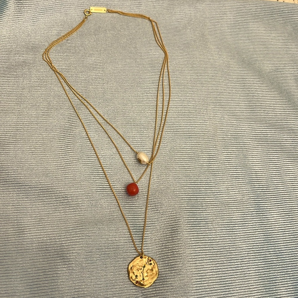 Carolina Herrera Scorpio triple necklace gold